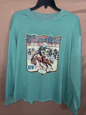 NWOT Women’s Medium Rodeo Las Vegas Graphic Long Sleeve Teal